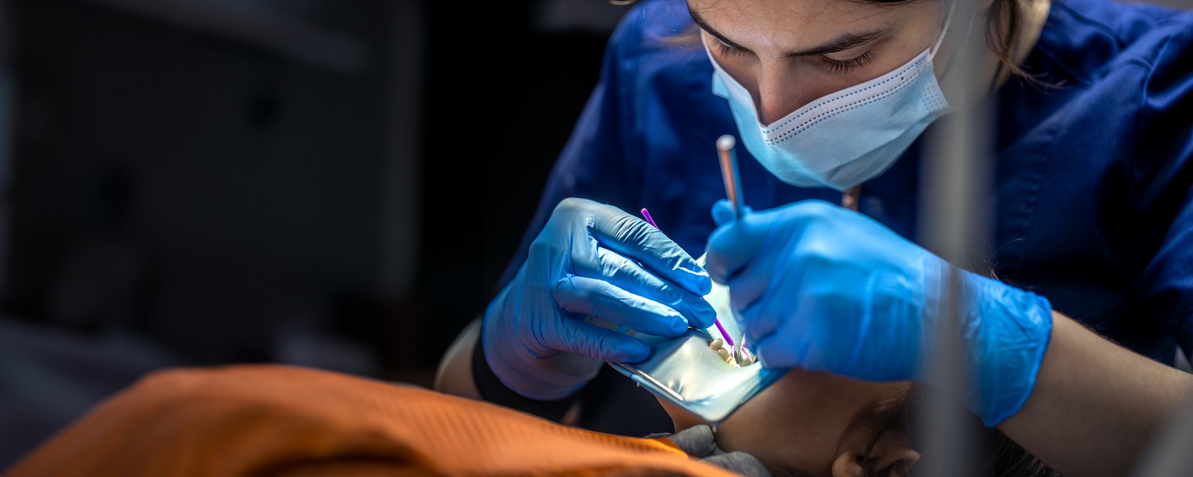 Pediatric dentist providing expert treatment